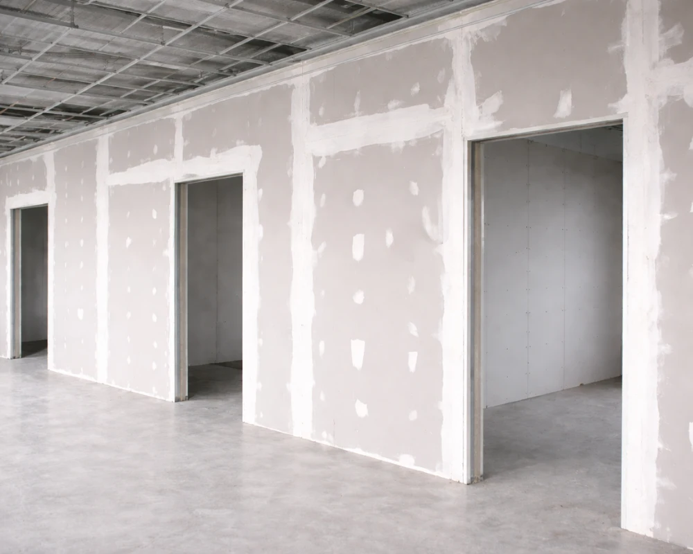 Fire rated plasterboard partition walls installed in a commercial building to create fire compartmentation and improve fire safety